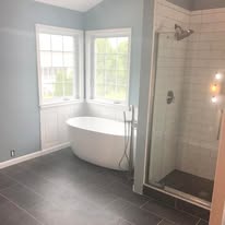 Master bathroom remodel with freestanding tub and walk-in tile shower