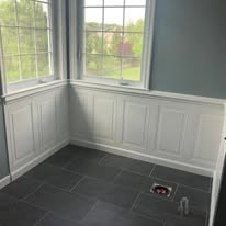 Bathroom wainscoting and large format tile floor