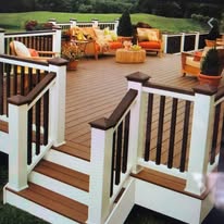 Multi-level composite deck with outdoor furniture